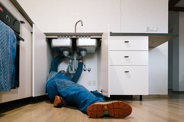 Professional Emergency Plumber technician working in Harvey, MI